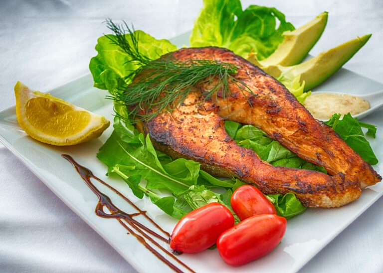 Grilled salmon with roasted turnips Photo by Dana Tentis CC0 on Pexels