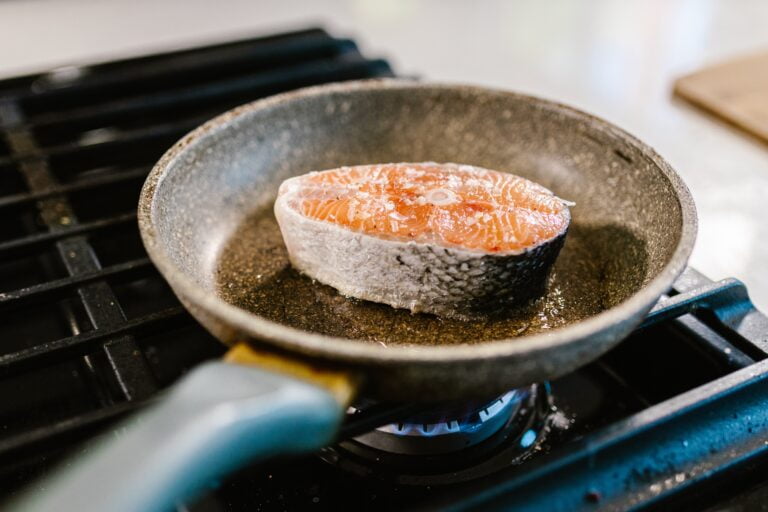 Salmon cake with roasted asparagus Photo by RODNAE Productions CC0 on Pexels